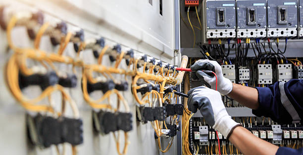 Professional Electrician technician working in Red Oak, TX
